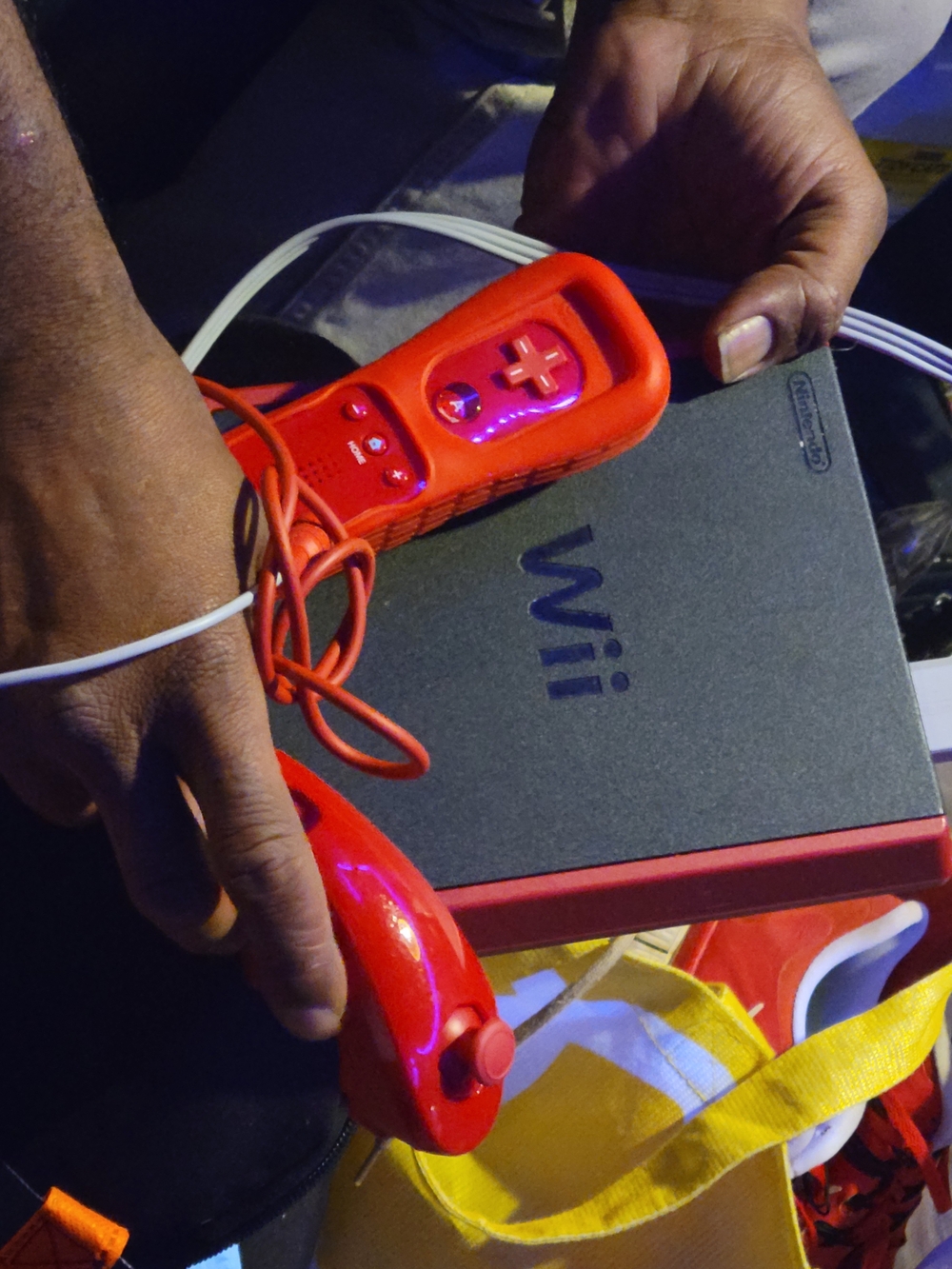 Nintendo Wii Mini Console with Red Remote and Red Nunchuk